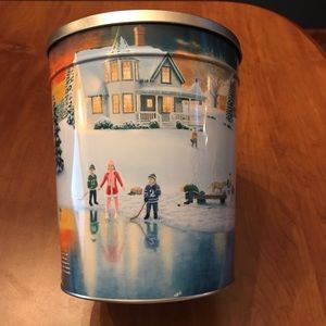Outdoor winter farm scene tin, approx 7.75” tall and 6.5” wide